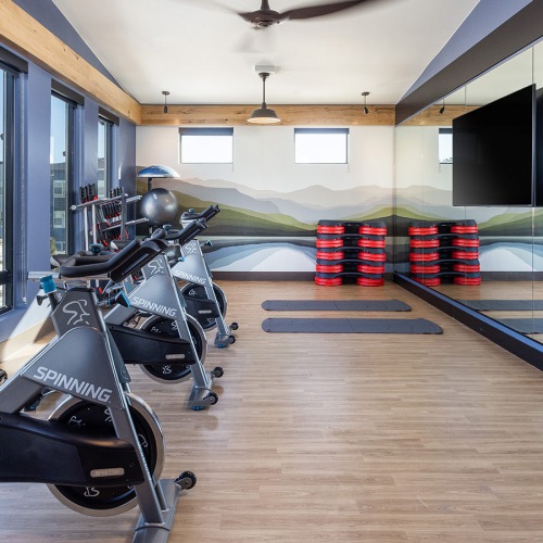 gym with wood floor and equipment gym with wood floor and equipment
